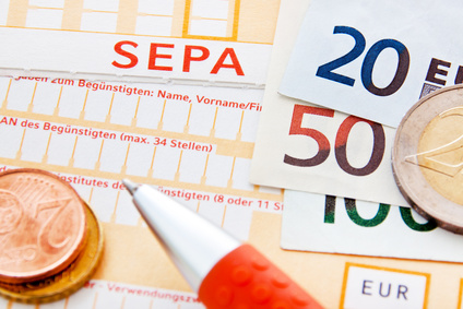 SEPA Zahlschein mit Münzen