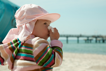 Kind Krank am Strand